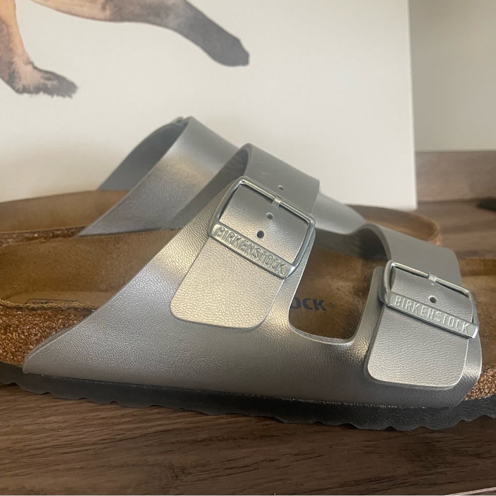 Gun metal grey, barely worn Birkenstocks.  Comfort meets style.